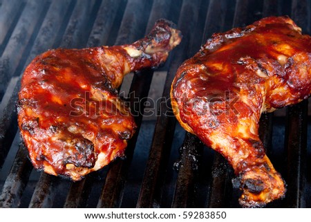 stock-photo-chicken-leg-quarters-on-barbecue-grill-59283850.jpg