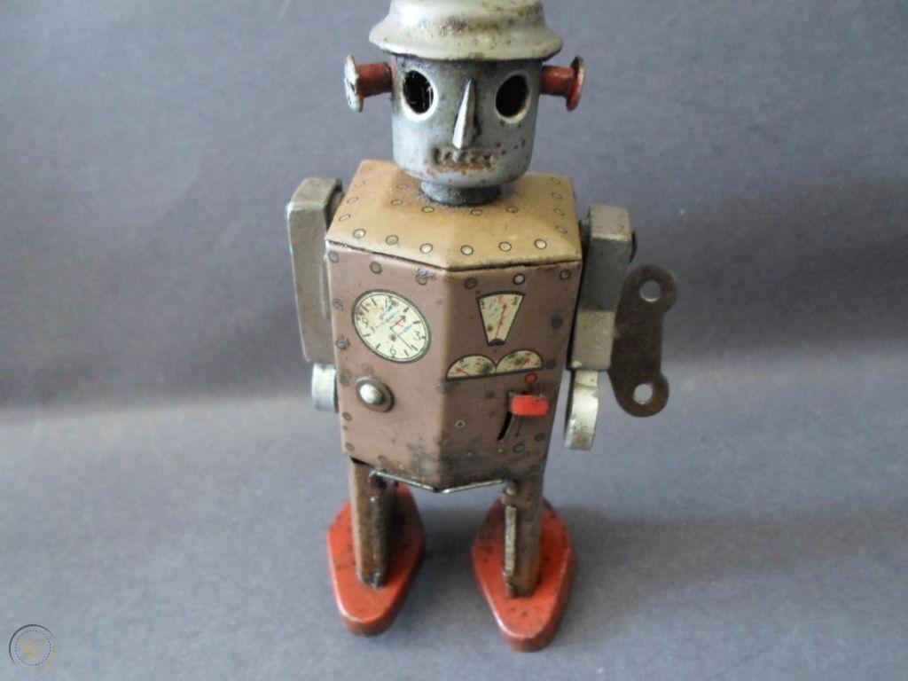original-ck-atomic-man-clockwork-tin_1_67c28d955bd91b034a2ec4a695c732e0.jpg