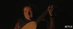 playing-the-lute-making-music.gif