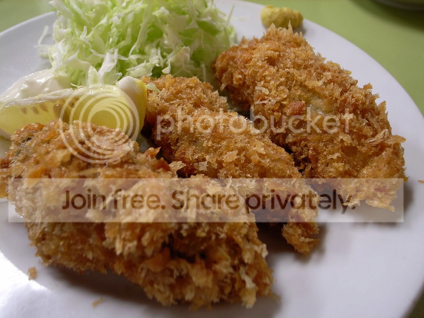 Deep_fried_oysters_by_KossyFINEDAYS.jpg